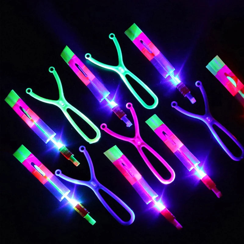 Incredible LED Light-Up Arrow Rocket Helicopter Flying Toy - Perfect for Parties & Fun Gifts - Includes Rubber Band Catapult!