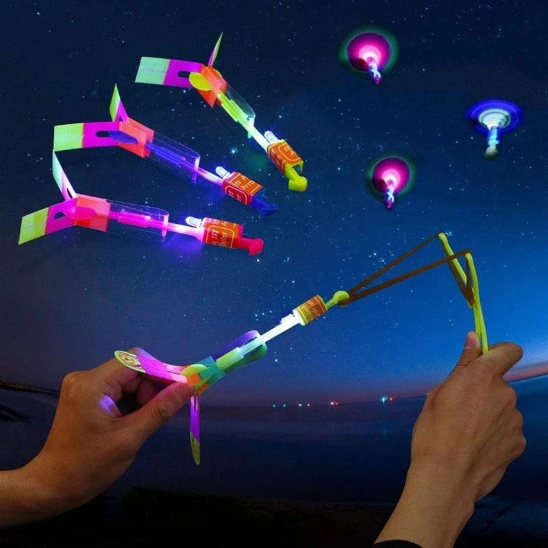 Incredible LED Light-Up Arrow Rocket Helicopter Flying Toy - Perfect for Parties & Fun Gifts - Includes Rubber Band Catapult!