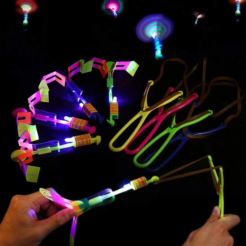 Incredible LED Light-Up Arrow Rocket Helicopter Flying Toy - Perfect for Parties & Fun Gifts - Includes Rubber Band Catapult!